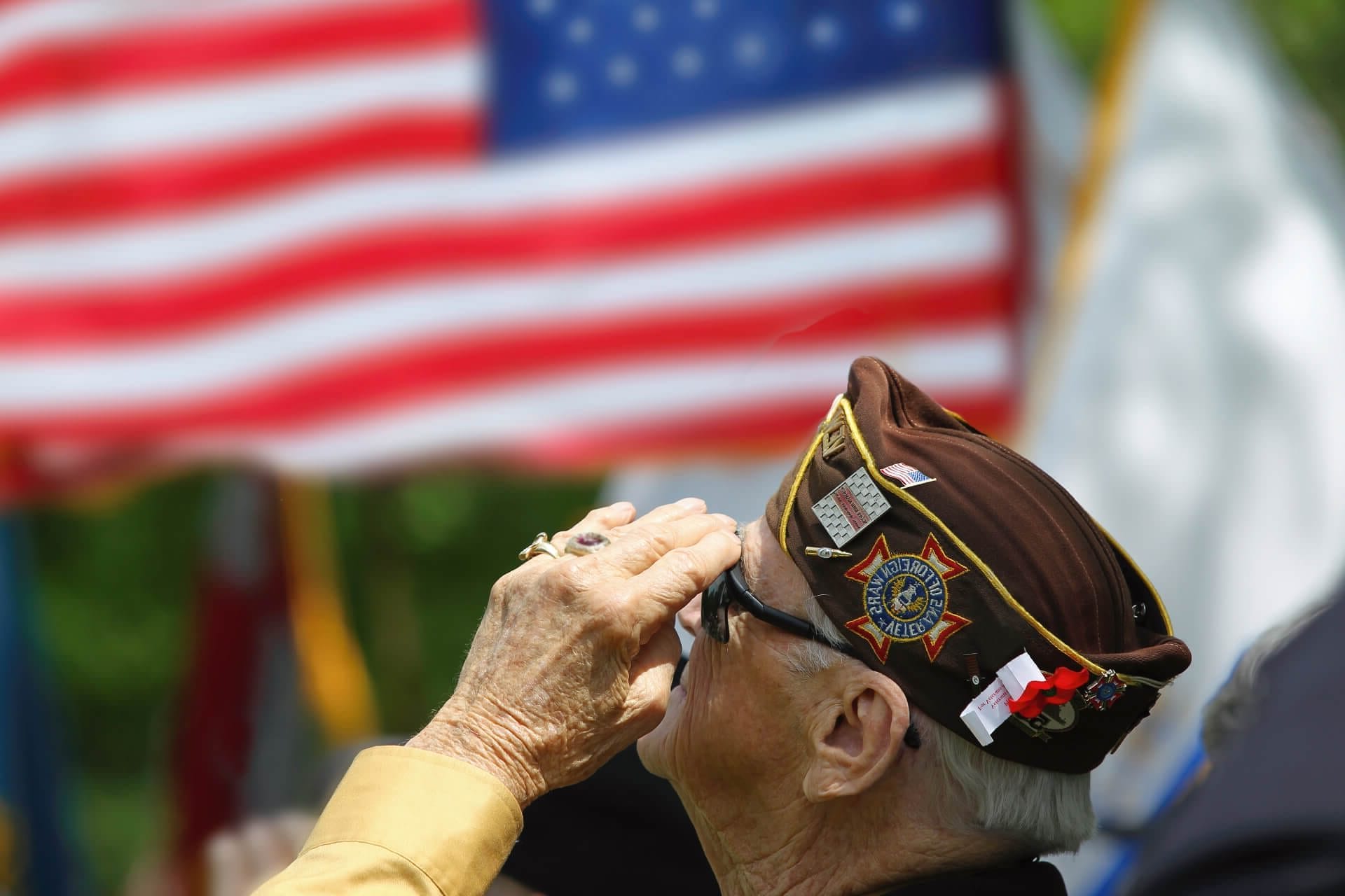 veteran saluting flag
